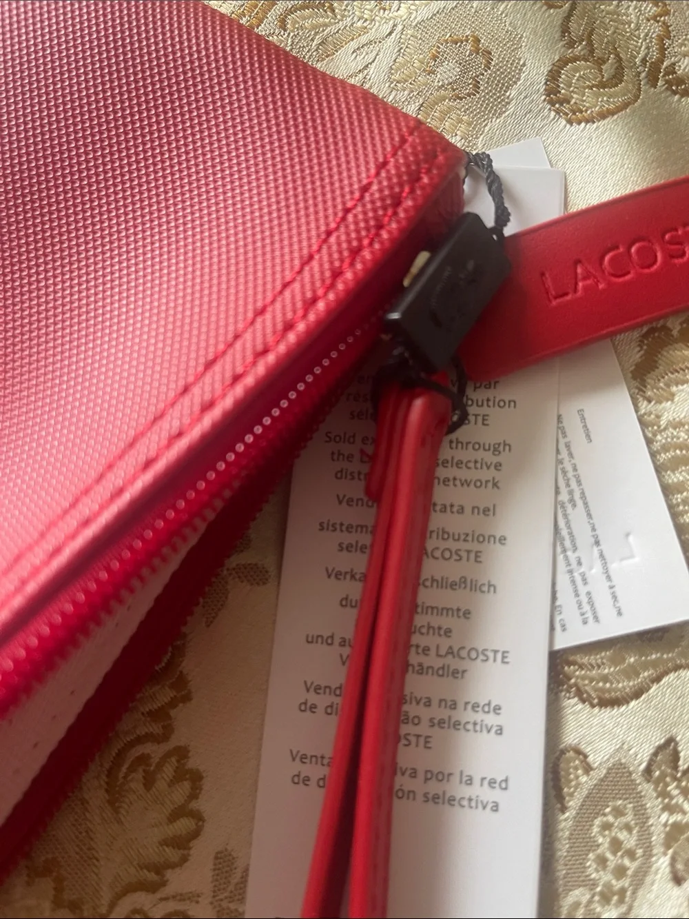 Lacoste Red Textured Wristlet with Signature Crocodile